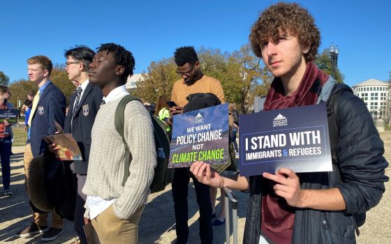 Students from the nation's Jesuit schools gather near the U.S. Capitol in Washington Nov. 8, 2021, to advocate for the environment and immigration as part of the Ignatian Family Teach-in for Justice. (CNS/Rhina Guidos)